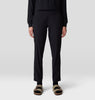 Person wearing black pants on a white background
