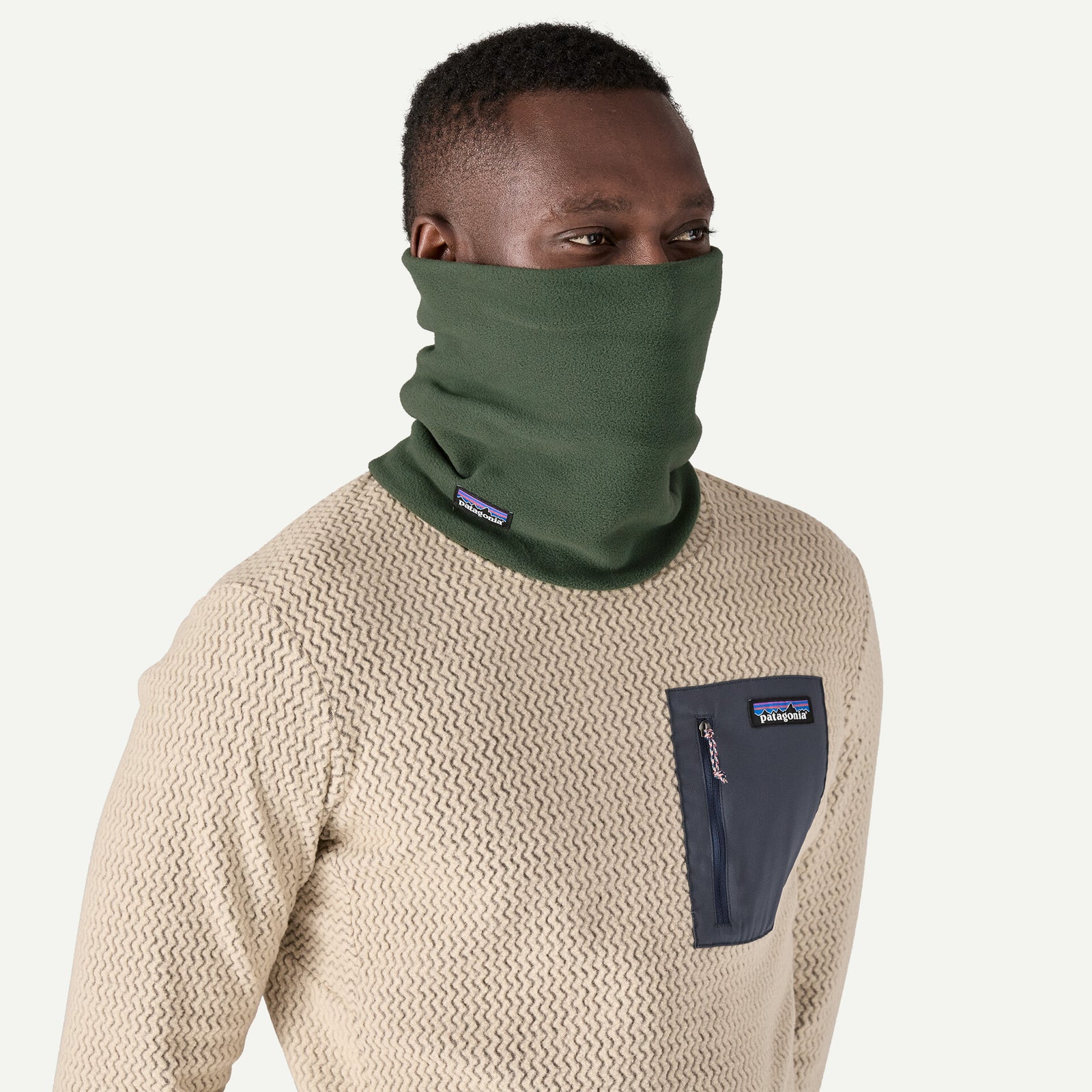 patagonia micro d gaiter in torrey pin green, worn by model