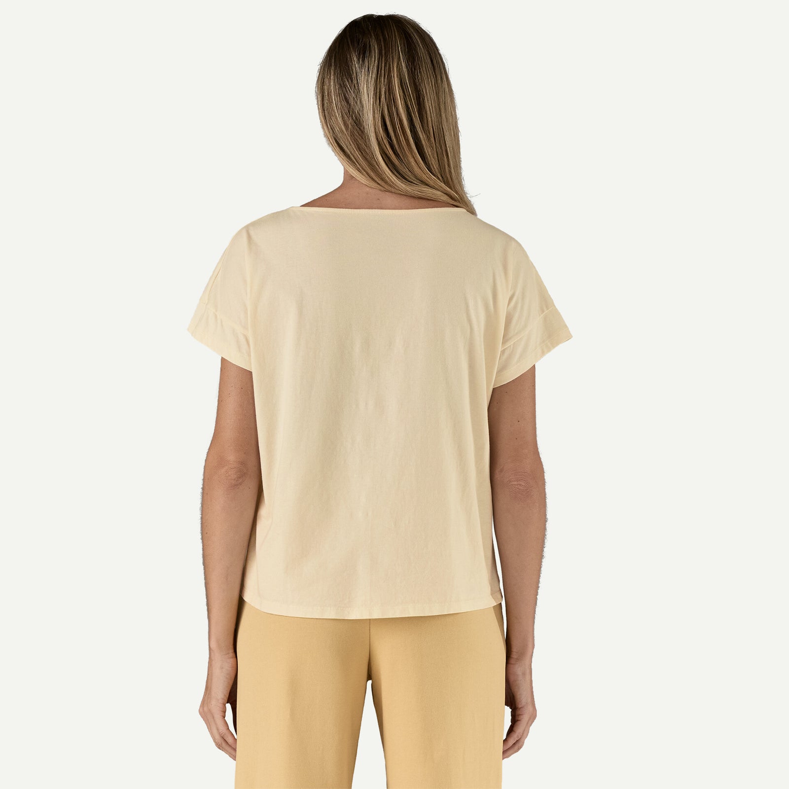 Patagonia Women's Sunfirst Relaxed Drop-Sleeve Organic T-Shirt in undyed natural, worn by model, back view