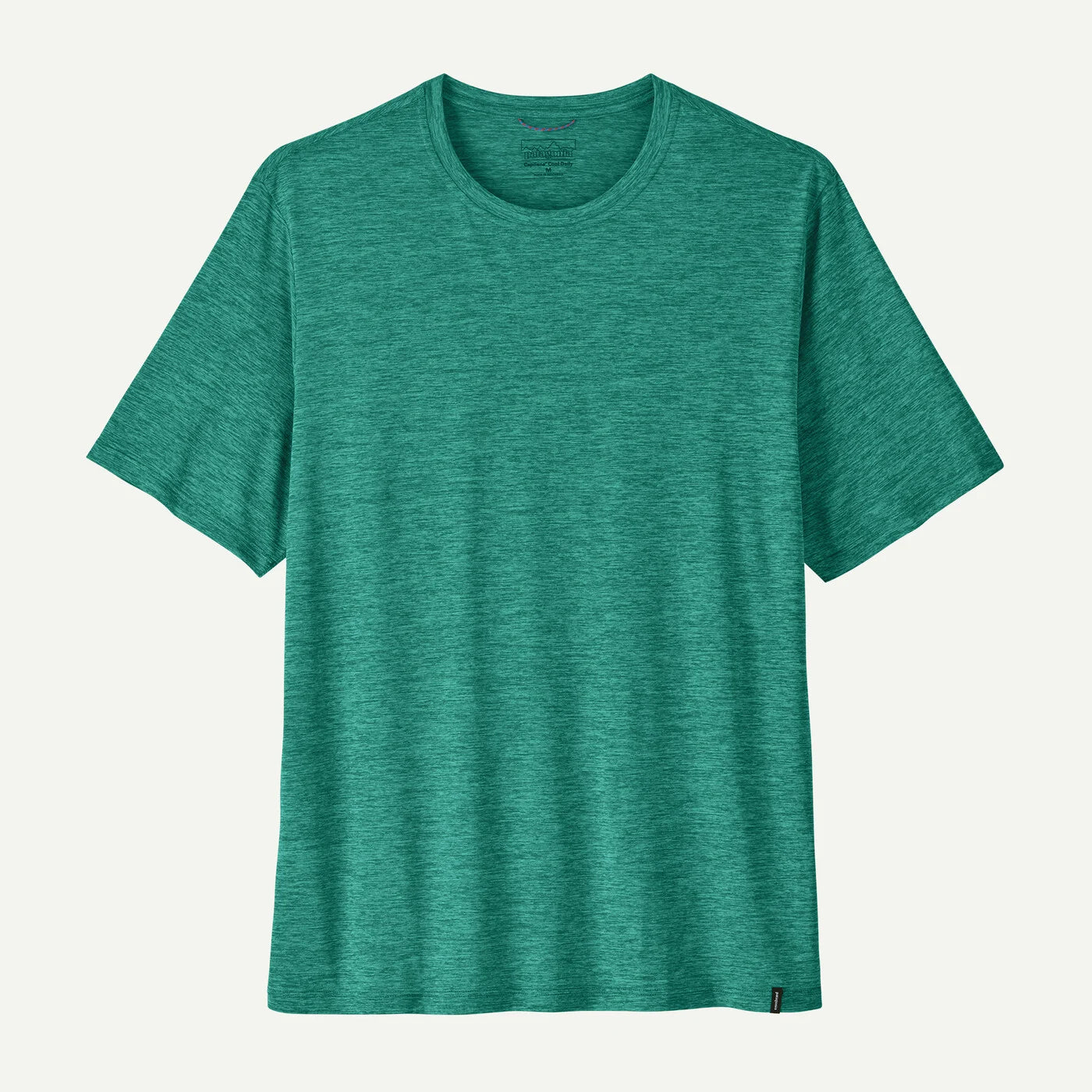 Green t-shirt on a light gray background