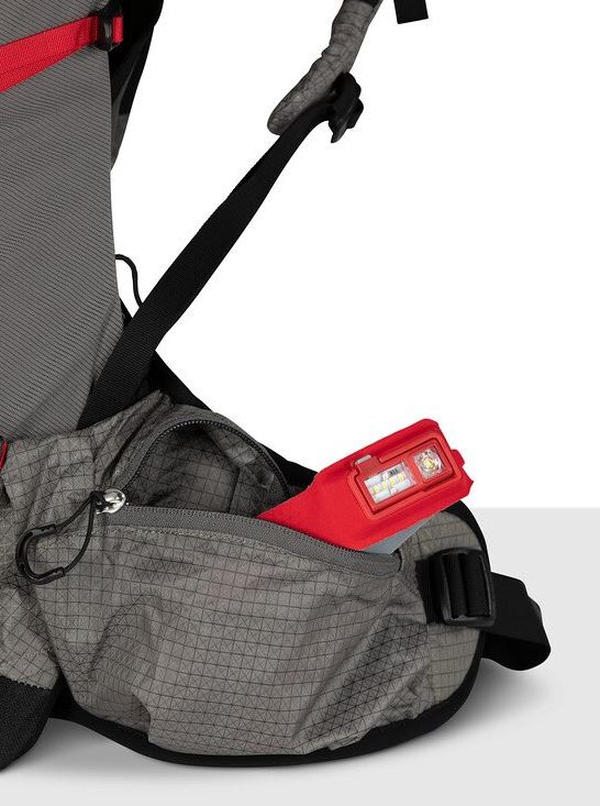a photo of the osprey eja pro 55 backpack in the color dale grey poinsettia red, detail view of hipbelt pocket