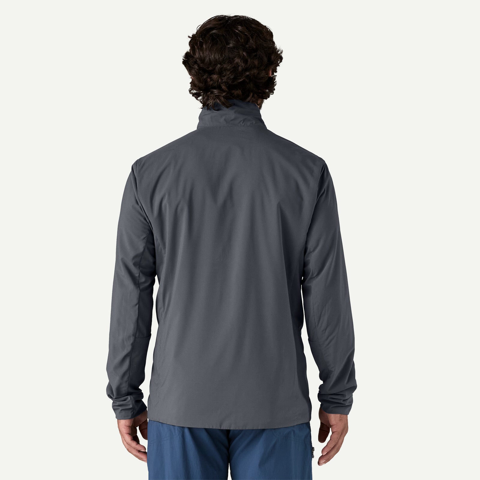 Patagonia Men's Nano-Air® Ultralight Pullover in color smolder blue, worn by model, back