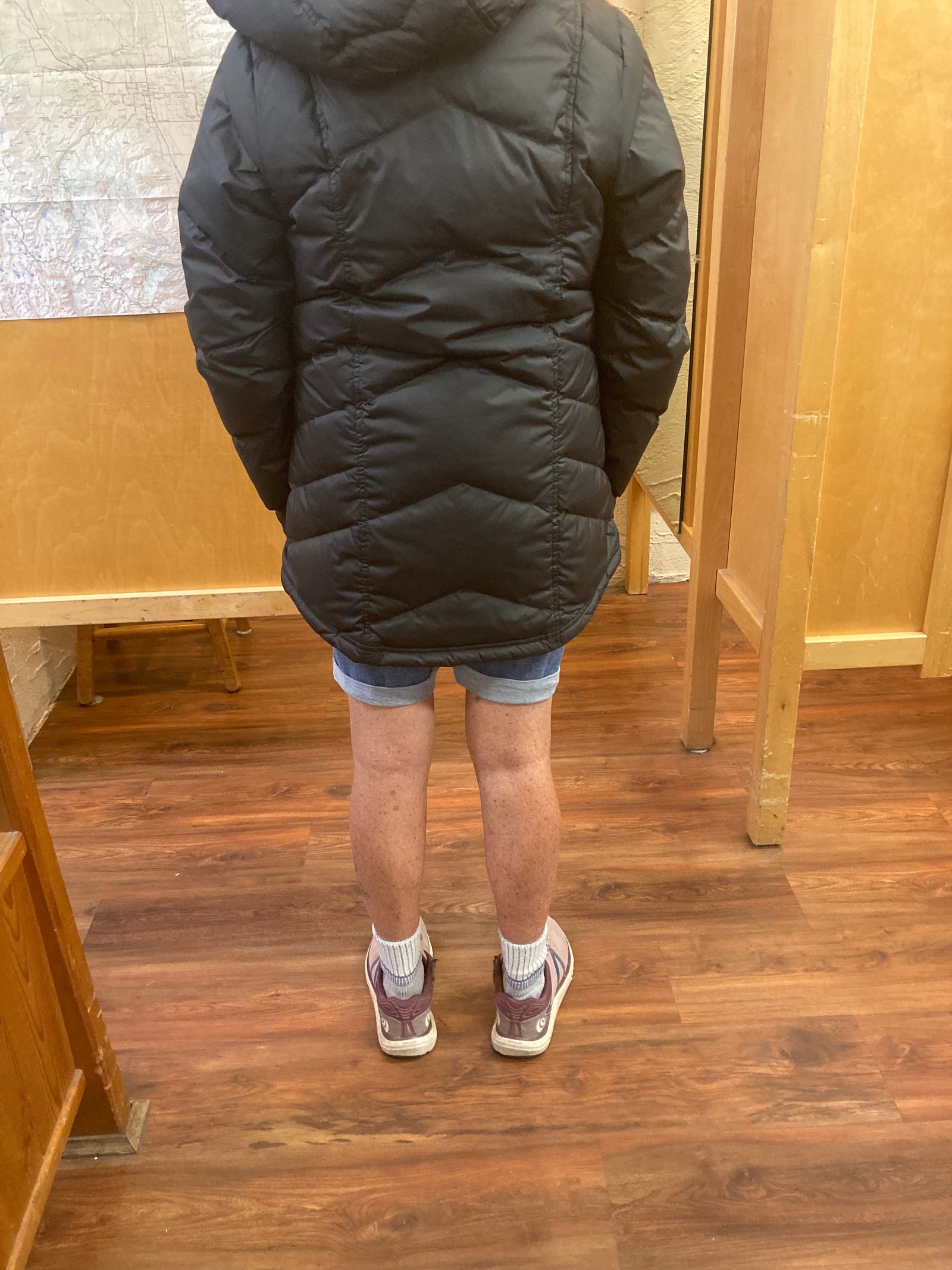 a woman wearing the patagonia down with it parka