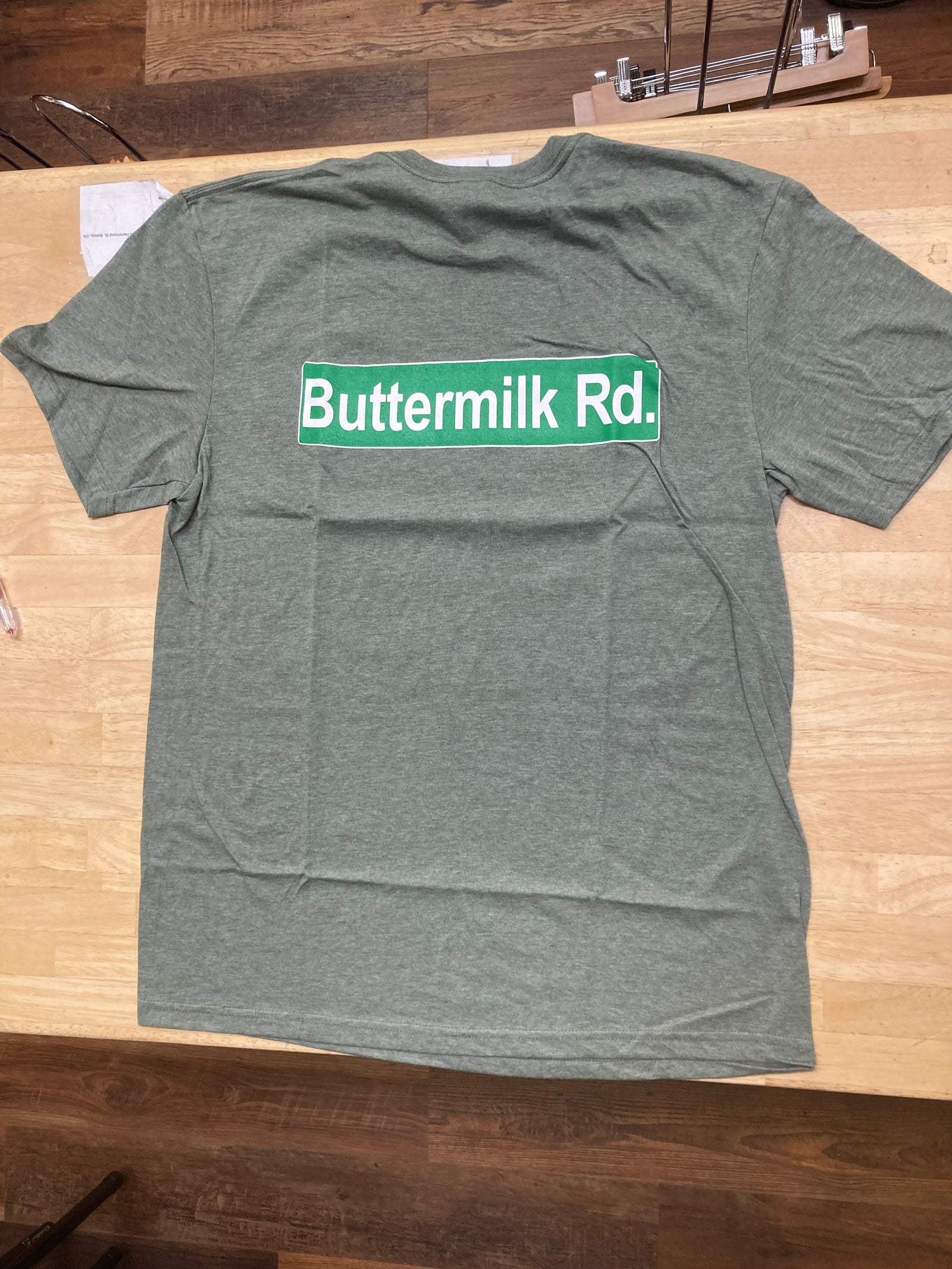 a picture of a tee shirt in green heather
back view
