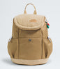 Beige backpack with a sherpa-like top on a light gray background