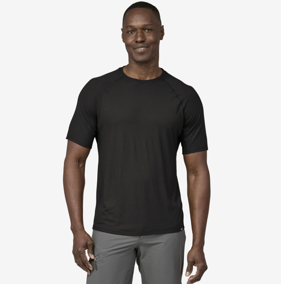 patagonia mens capilene cool trail tee shirt in the color black on a model front view