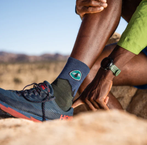 darn tuff pct micro crew sock on a model with shoes on