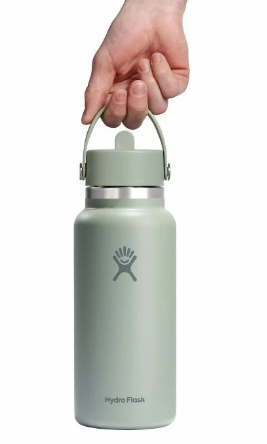 hydroflask 32 oz wide mouth straw bottle in tonal agave shown with a hand for size