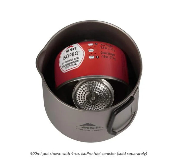 the msr titan kettle 900 shown with the 4 oz fuel canister inside of it