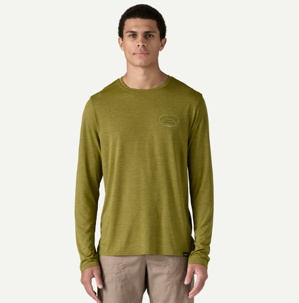 patagonia capilene cool daily graphic mens long sleeve shirt in color graze green x dye, front view on a model