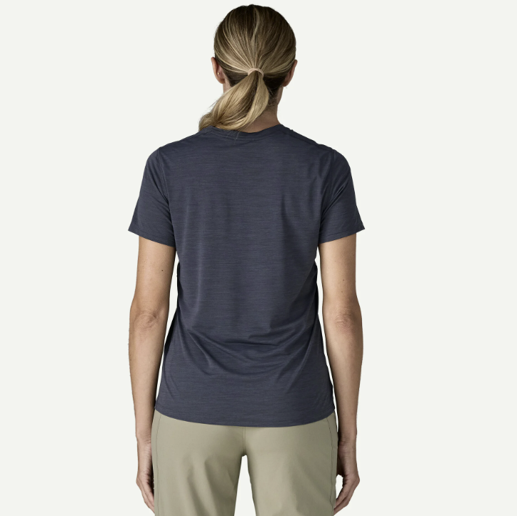 patagonia womens capilene cool ultra shirt in smolder blue back view on a model