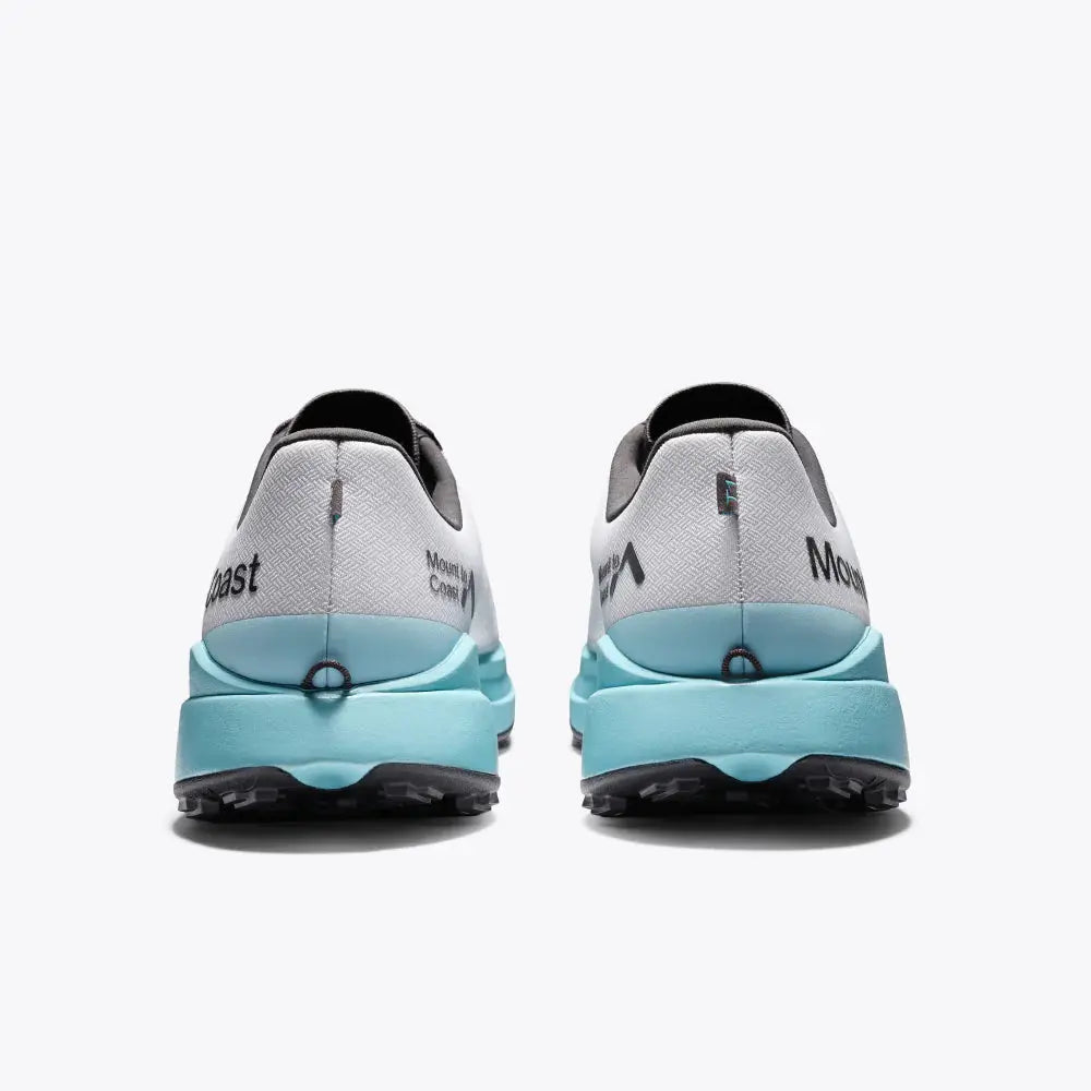 Pair of gray and light blue athletic shoes with 'Mega' branding on a white background