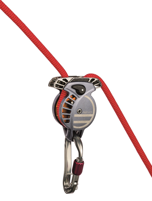 the wild country revo belay device shown loaded with a rope