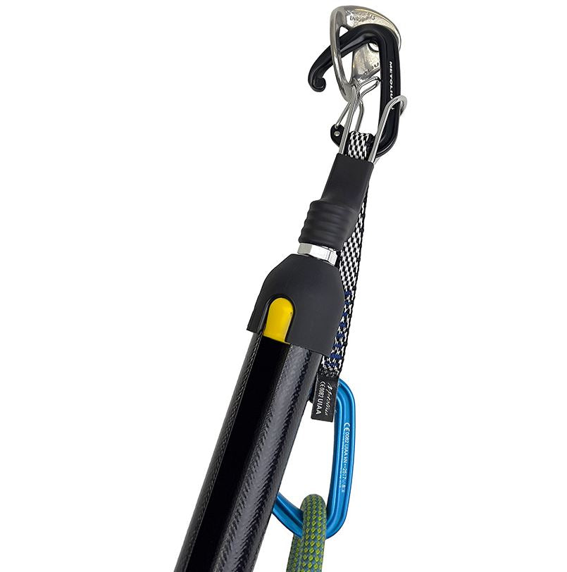 a photo of the metolius superclip on the end of a pole, being used to clip a bolt