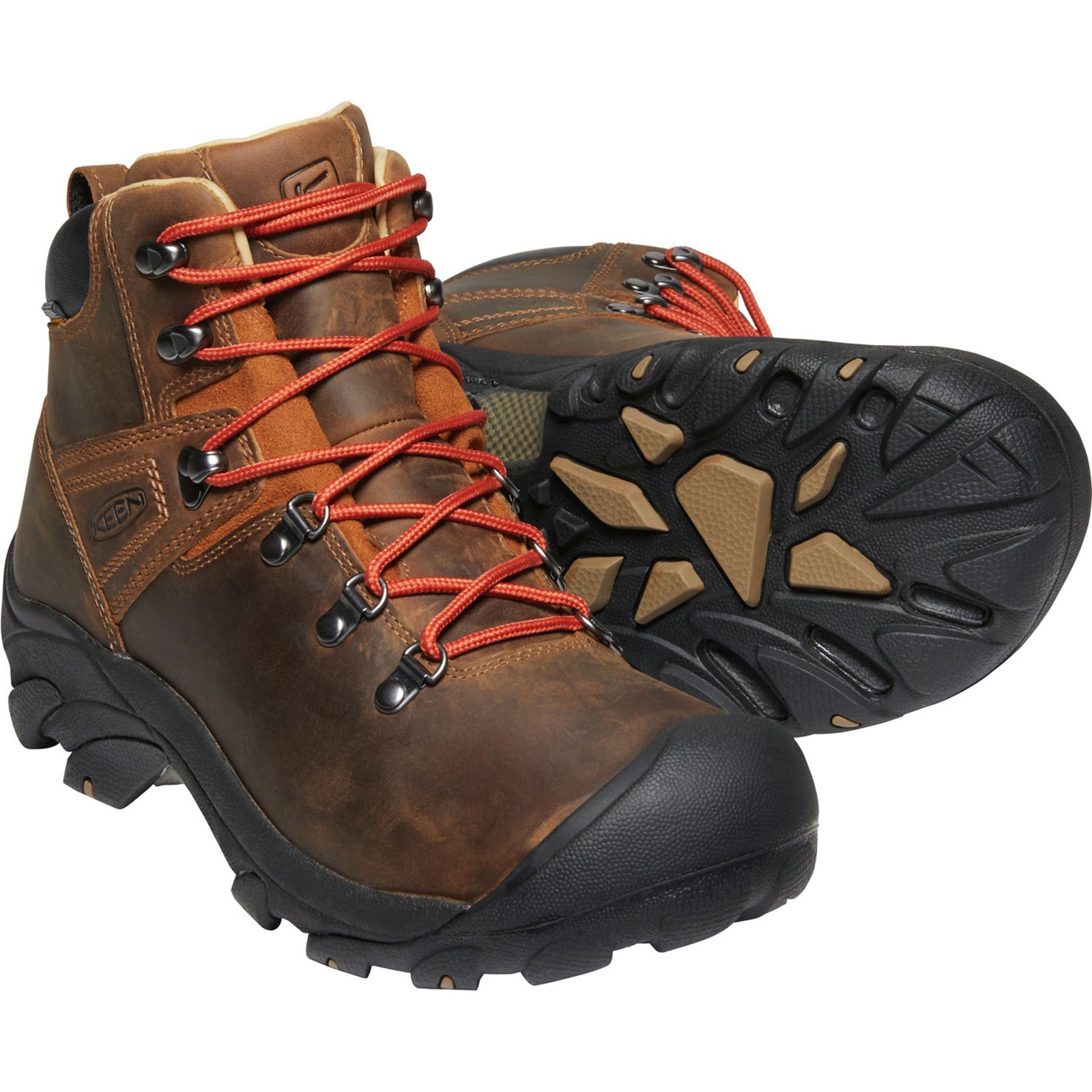 a pair of men's pyrenees hiking boots showing the sole as well as a side view