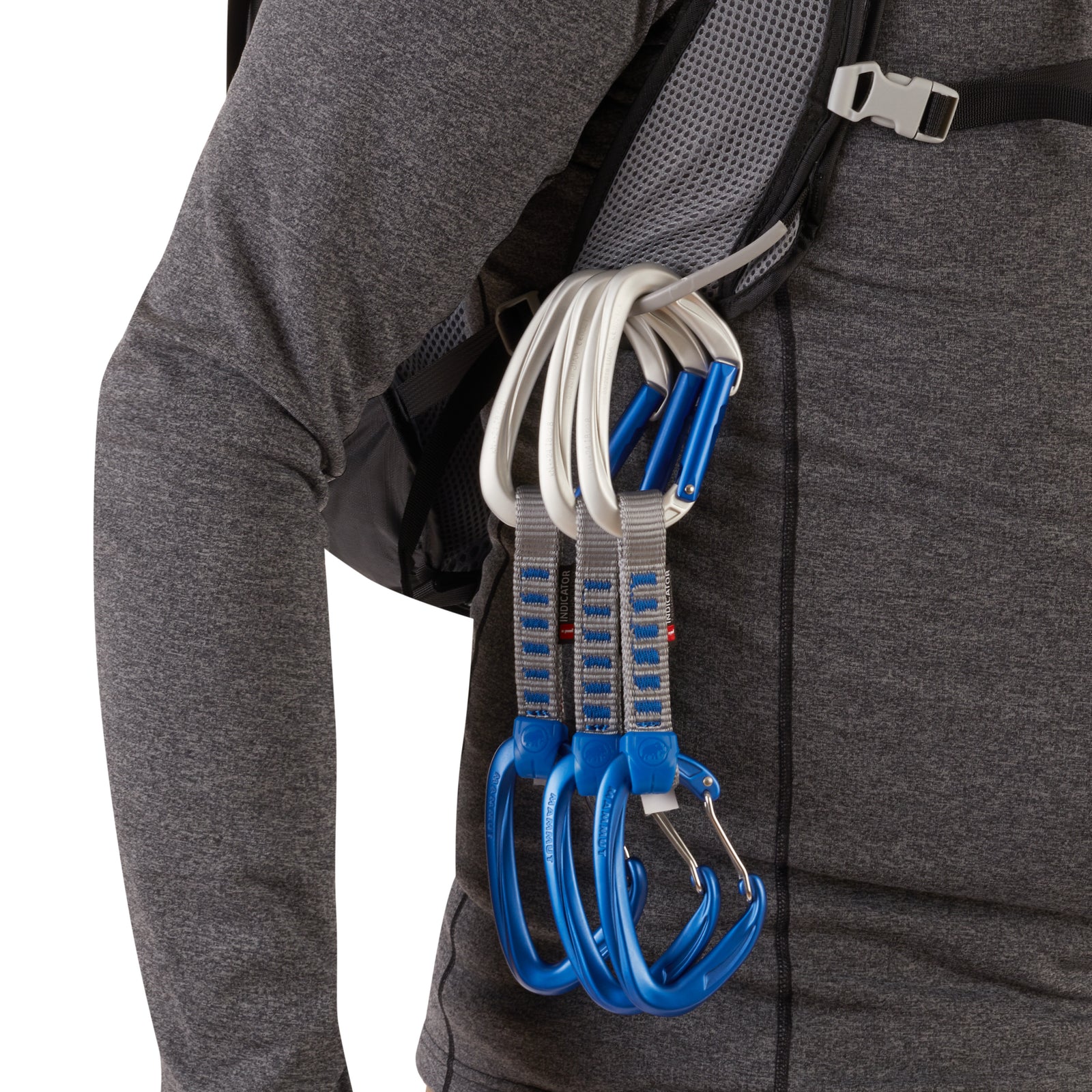 three quick draws are shown clipped to the gear loops on the pack which is being worn by a model