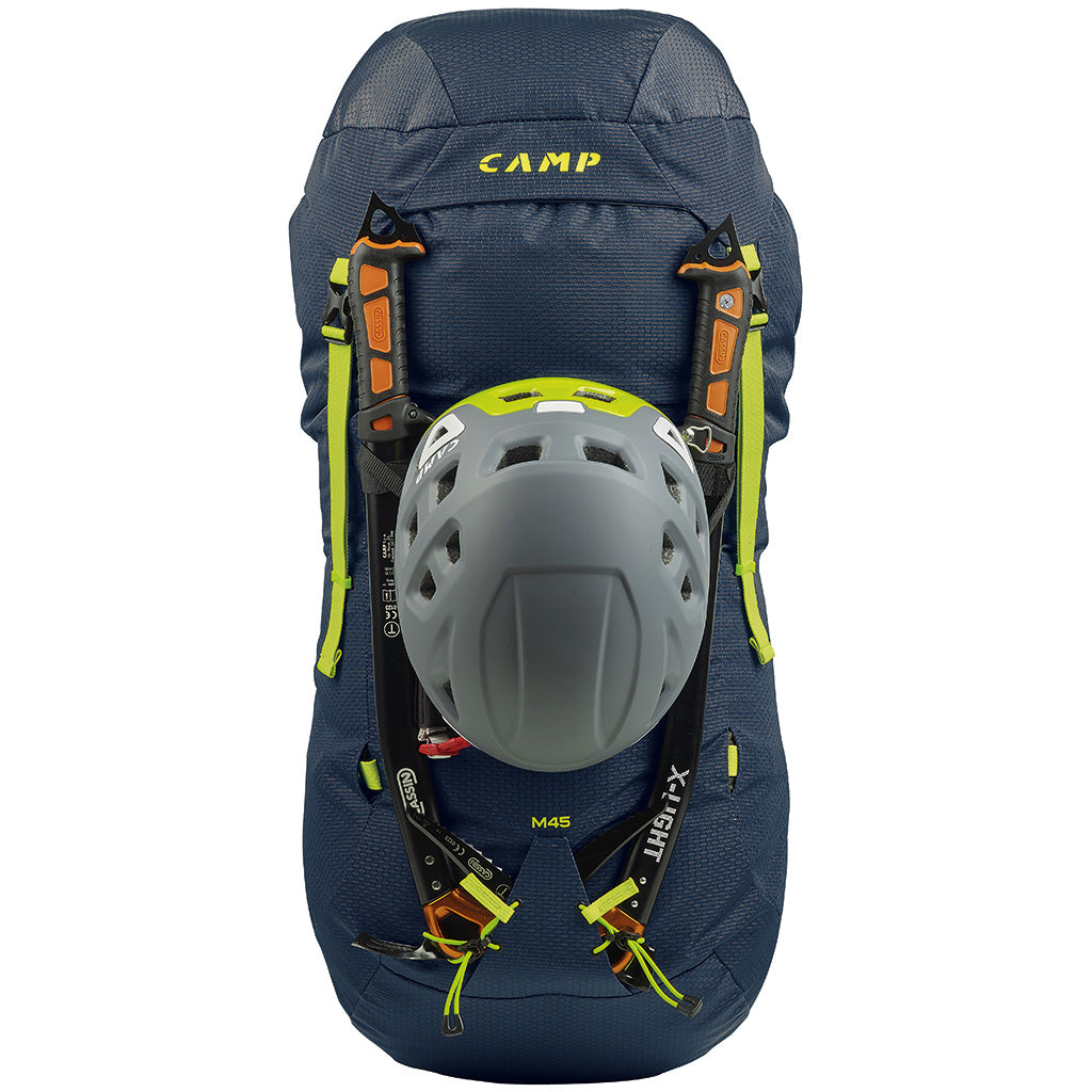 The m45 pack stuffed out with a helmet on the back