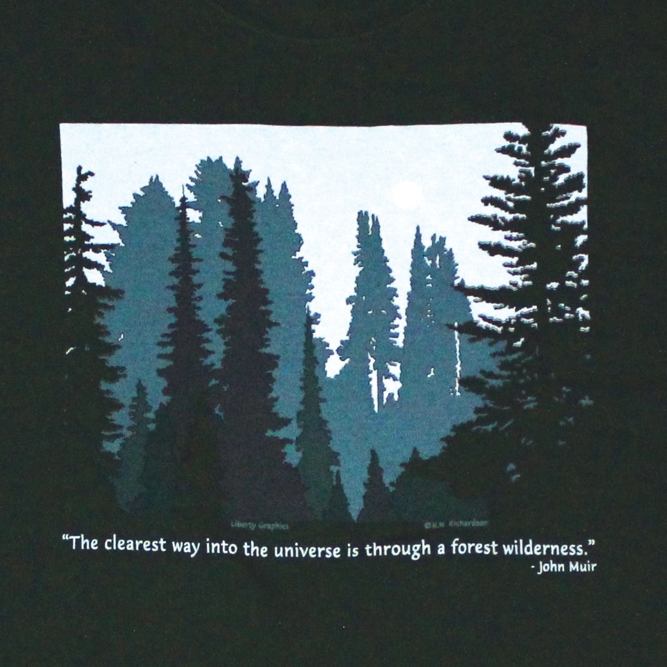 close up of the print on the forest wilderness tee shirt 