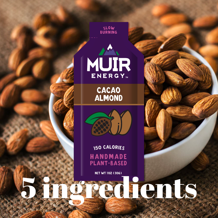 the cacao almond package on a background of almonds in a bowl