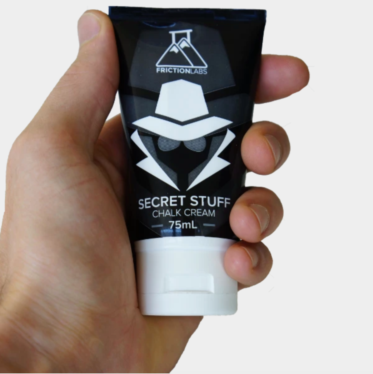 friction labs liquid chalk tube front view in model hand