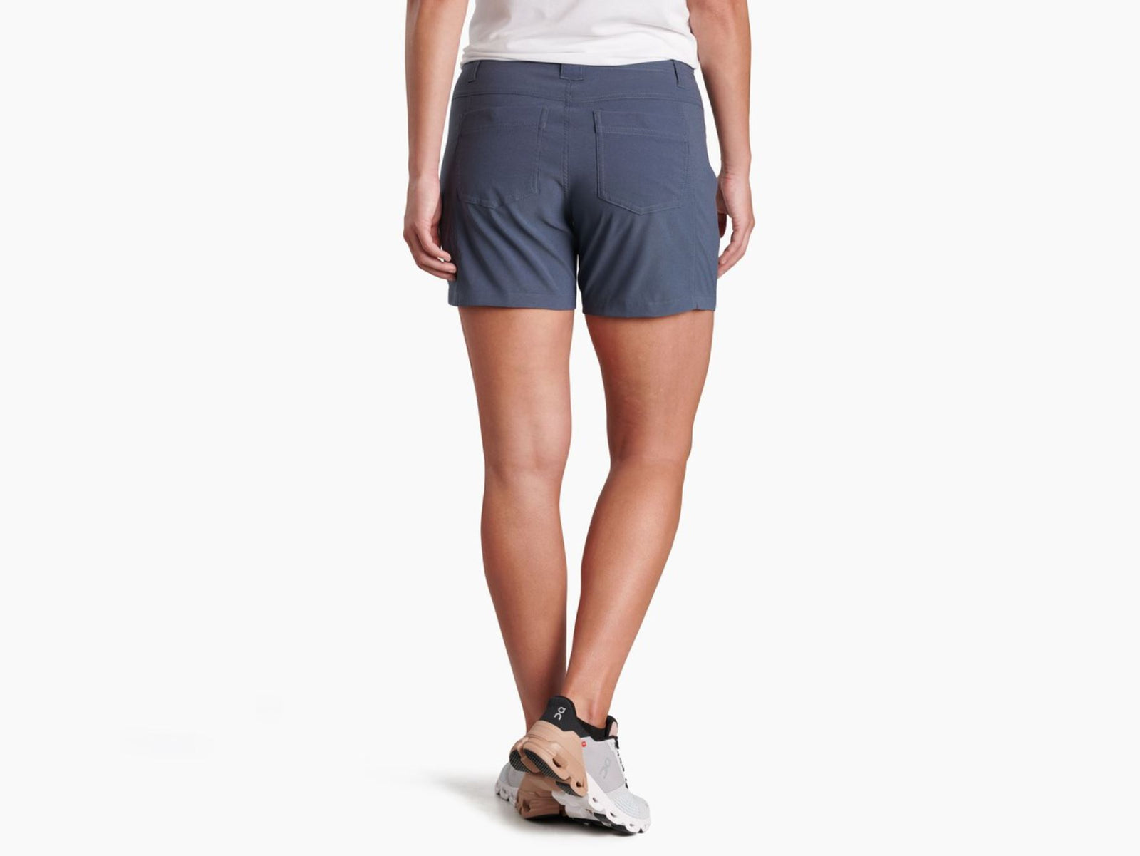 kuhl womens trekr 5 inch shorts on a model, back view in inkwell