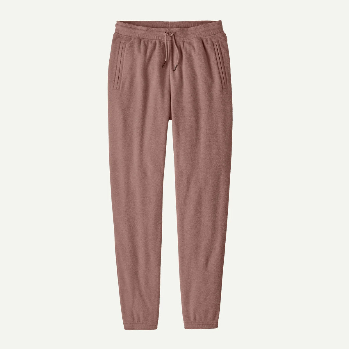 A pair of women's jogger sweatpants in a dusty rose or mauve color, featuring an elastic waistband with a drawstring and side pockets, shown against a plain white background.