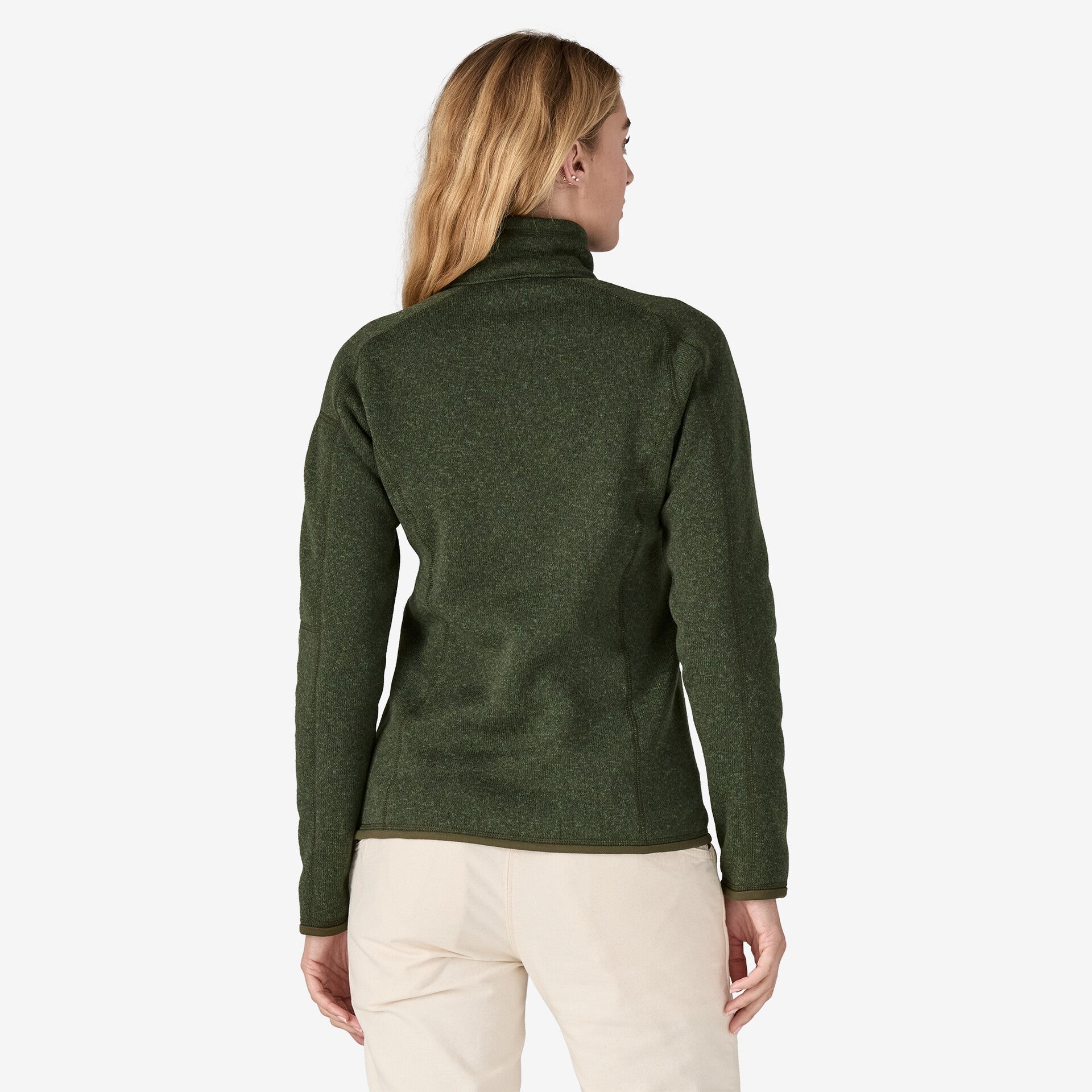 front view of the patagonia womens better sweater quarter zip fleece in the color torrey pine green, on model, back