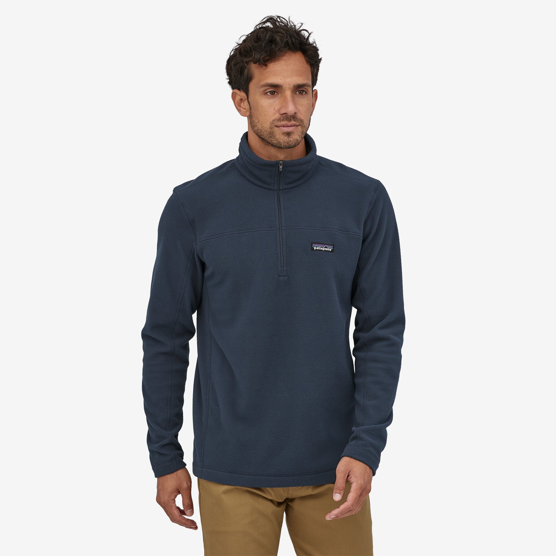 patagonia mens micro d pullover in new navy, front view, worn by model