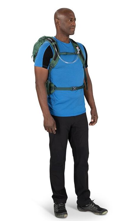 a photo of the osprey skarab 30 liter pack in the color tundra green, front view on a model