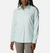 a model wearing the columbia silver ridge utility long sleeve shirt womens in the color aqua, front view