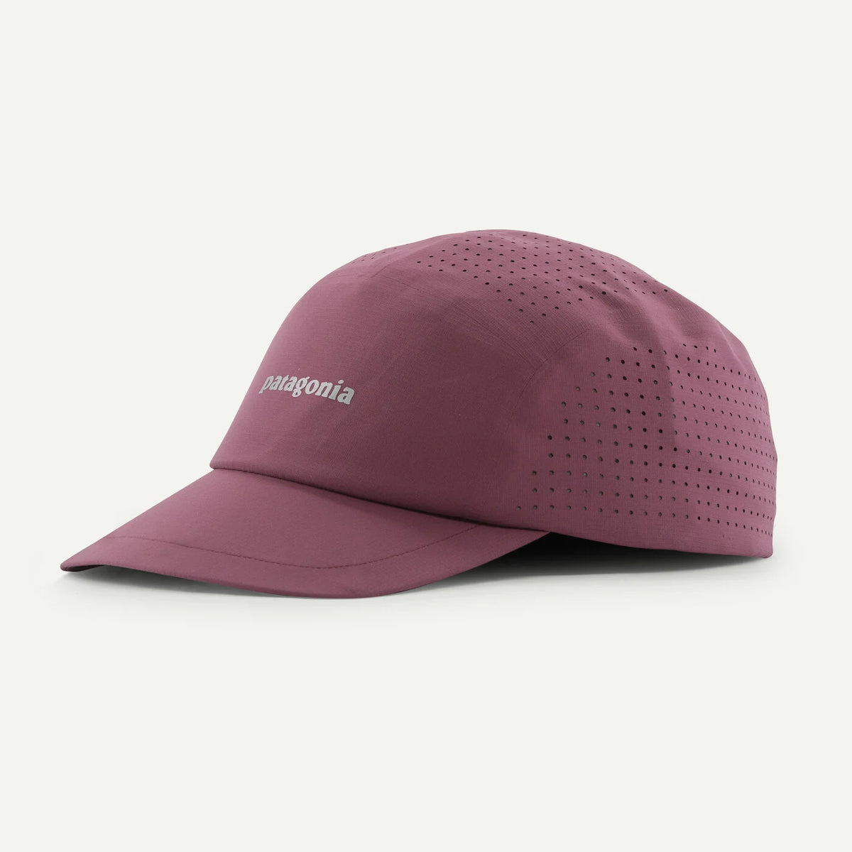 A Patagonia running cap in a dusty mauve-purple color, featuring a curved brim, perforated side panels, and the Patagonia logo embroidered on the front, set against a plain off-white background.
