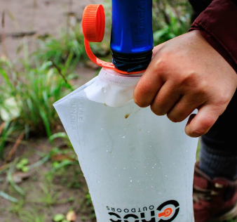 cnoc 3l orange 28mm bag being used with a filter