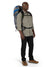 a photo of the osprey exos pro 55 backpack in the color dale grey agam blue, front view on a model