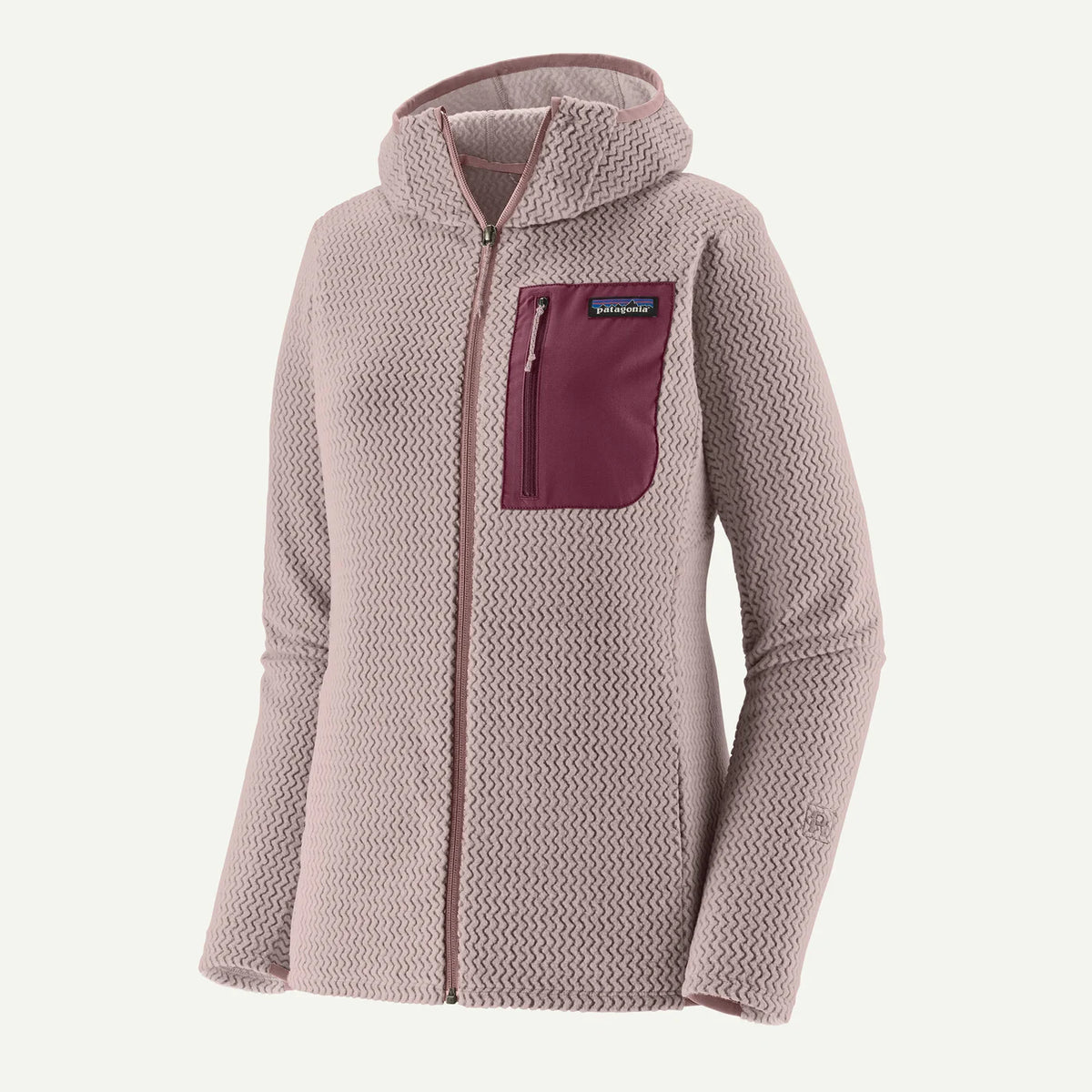 A women's Patagonia hooded zip-up fleece jacket in a dusty mauve-pink color, featuring a contrasting dark burgundy chest pocket with a vertical zipper and a small Patagonia logo tab.