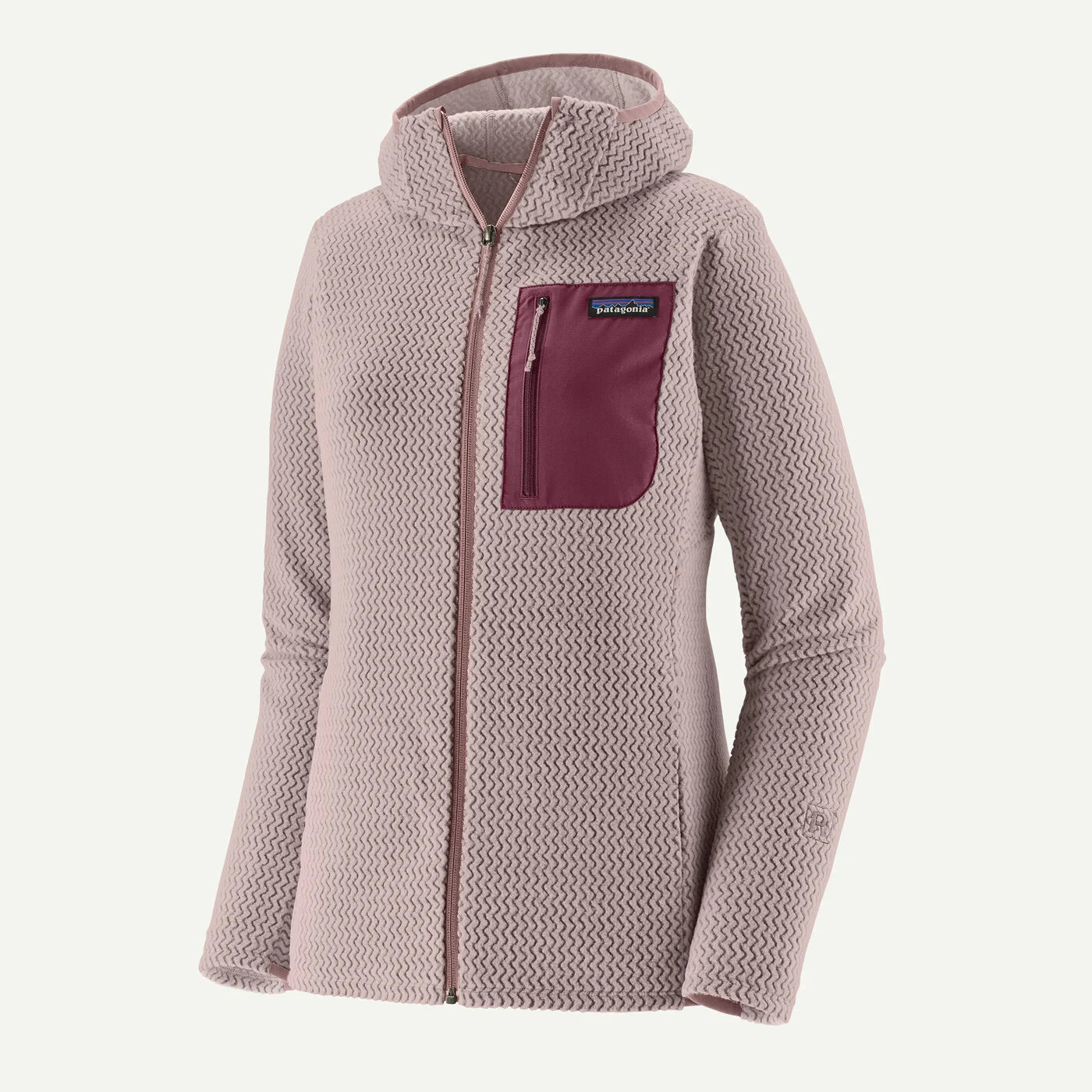 A women's Patagonia hooded zip-up fleece jacket in a dusty mauve-pink color, featuring a contrasting dark burgundy chest pocket with a vertical zipper and a small Patagonia logo tab.