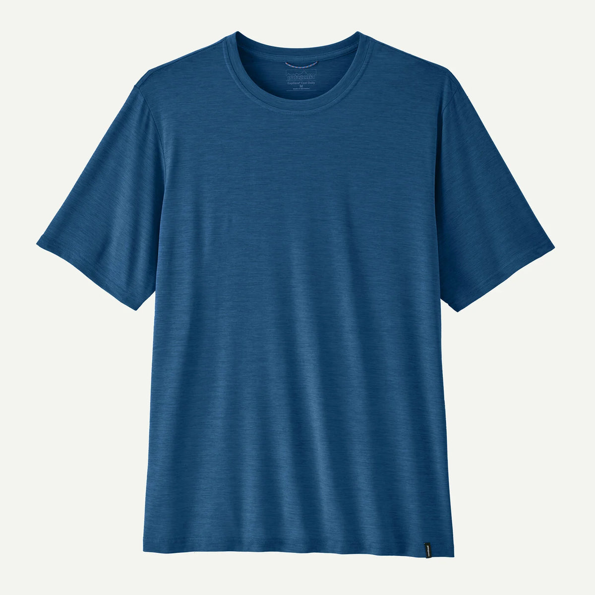 Blue t-shirt on a light gray background