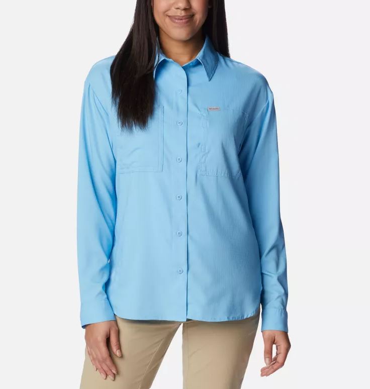 a model wearing the columbia silver ridge utility long sleeve shirt womens in the color vista, front view