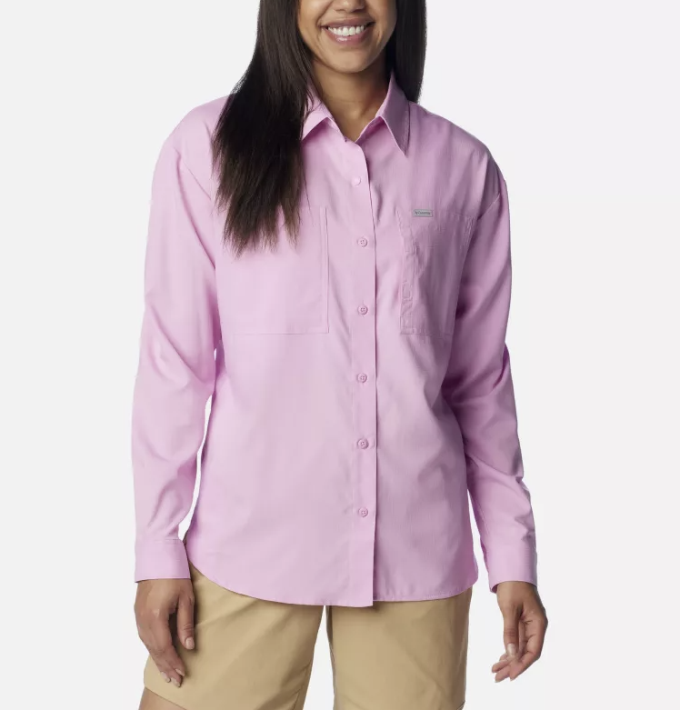 a model wearing the columbia silver ridge utility long sleeve shirt womens in the color cosmos, front view
