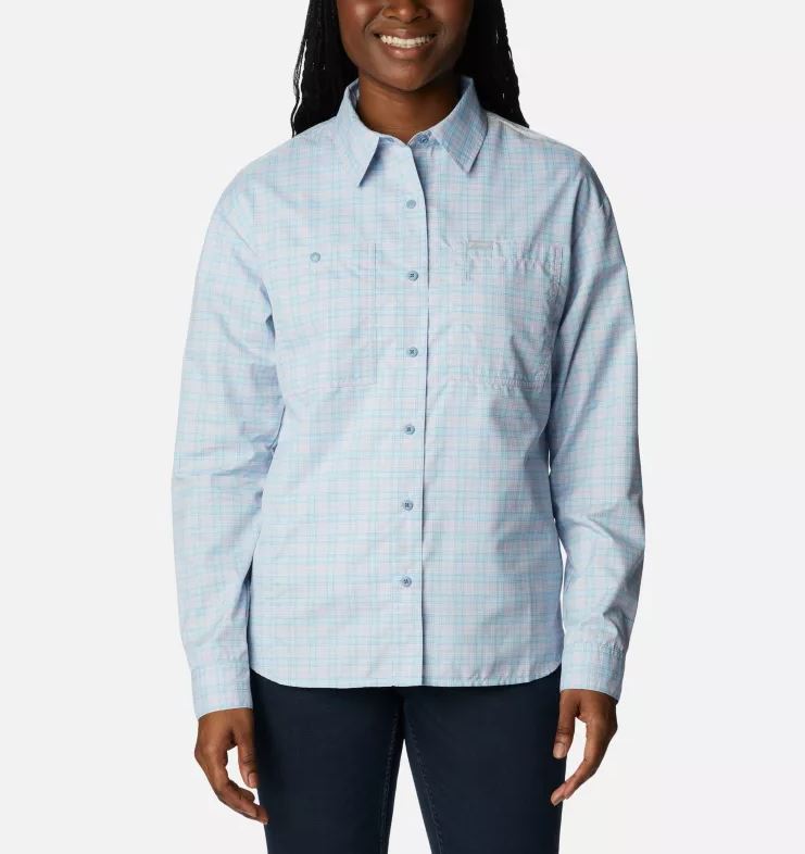 a model wearing the columbia womens silver ridge utility patterned long sleeve shirt in the color purple tint peak plaid, front view