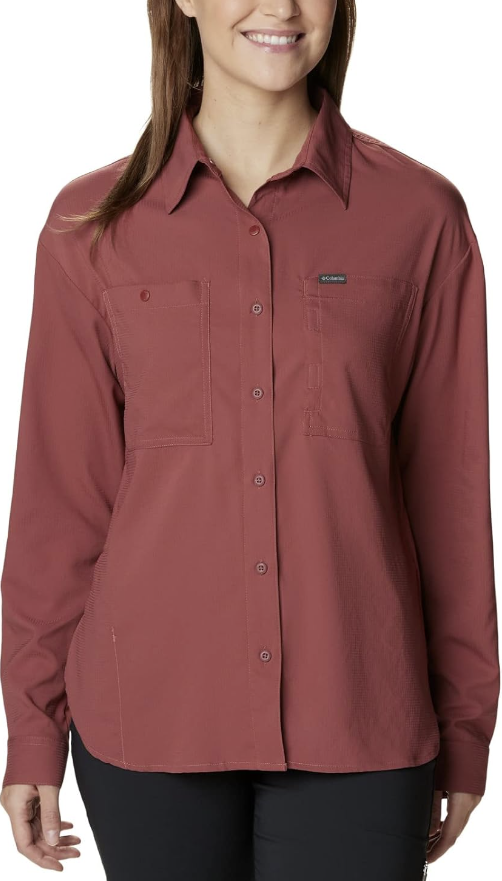 a model wearing the columbia silver ridge utility long sleeve shirt womens in the color beetroot, front view