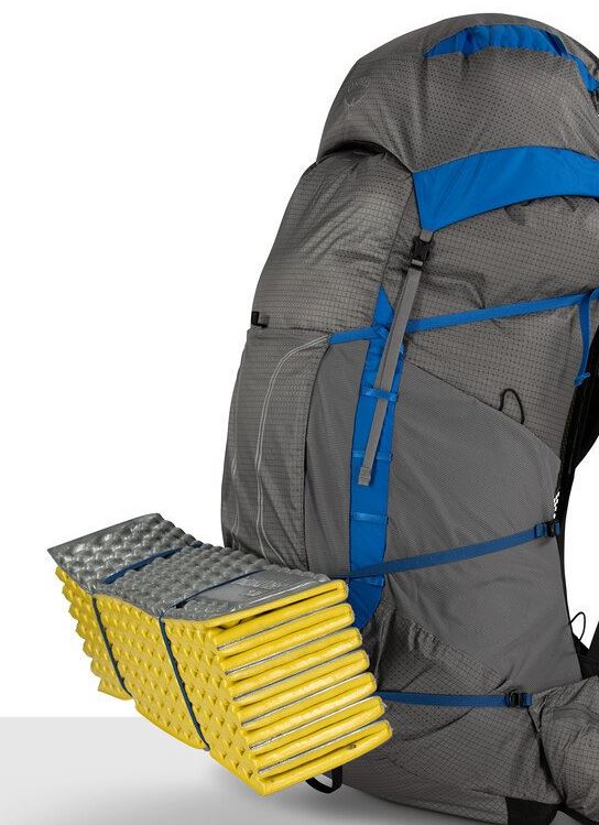 a photo of the osprey exos pro 55 backpack in the color dale grey agam blue, view of the sleeping pad attachement system