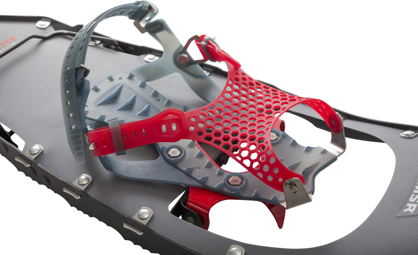 Close-up of a snowshoe with red binding mechanism on a white background