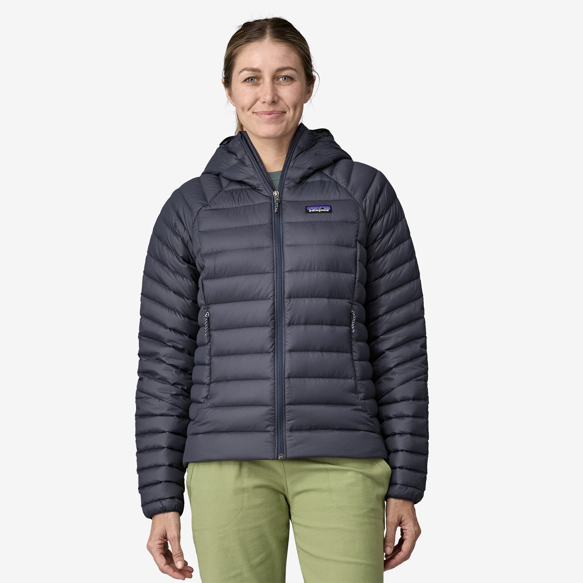 patagonia womens down sweater hoody in the color smolder blue, worn by model, front view