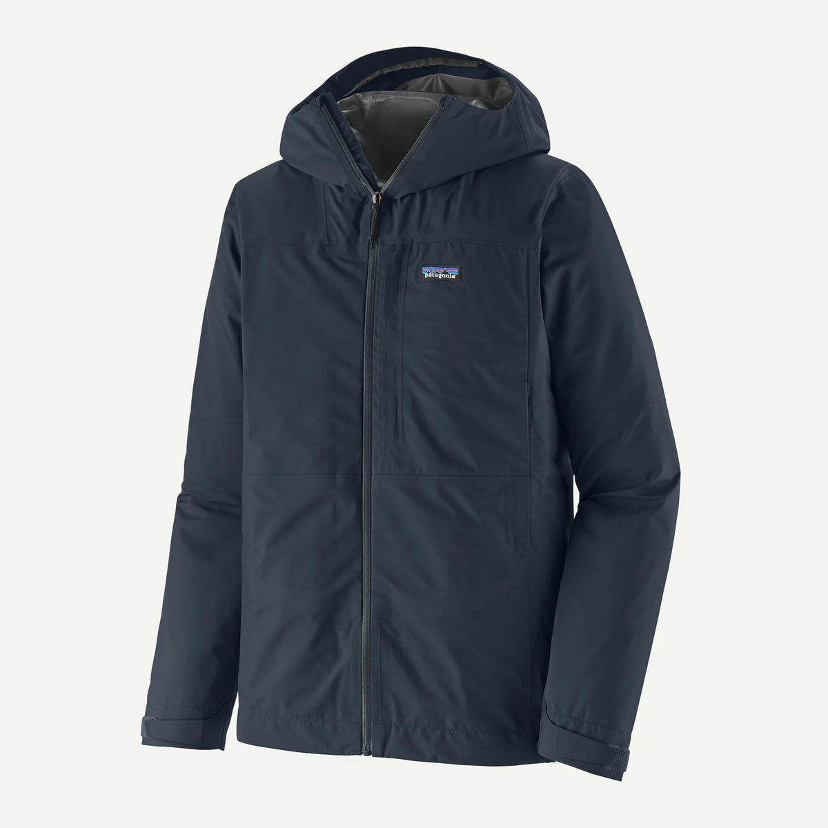 Navy blue jacket with a brand logo on a light gray background