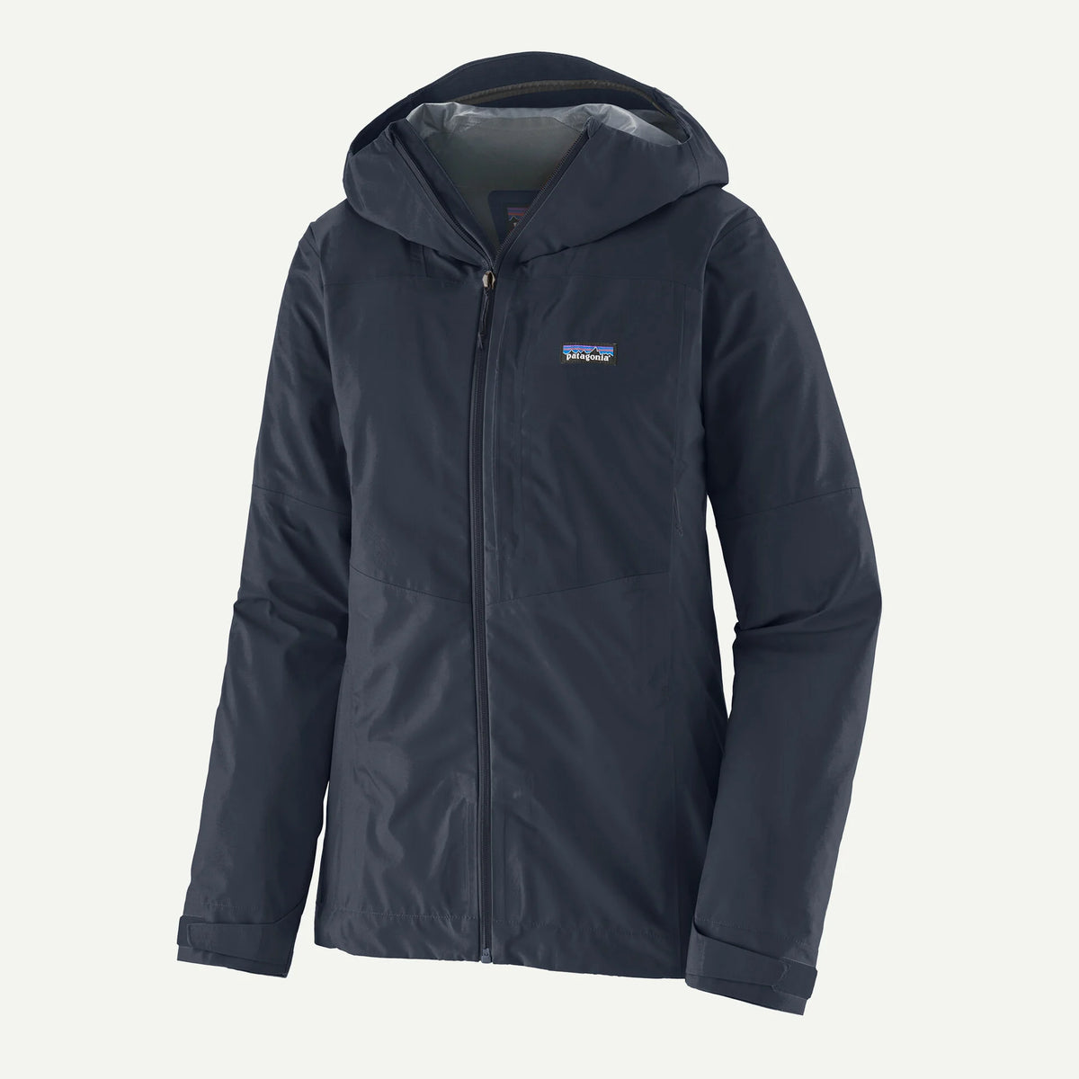 Dark blue jacket with a brand logo on a light gray background