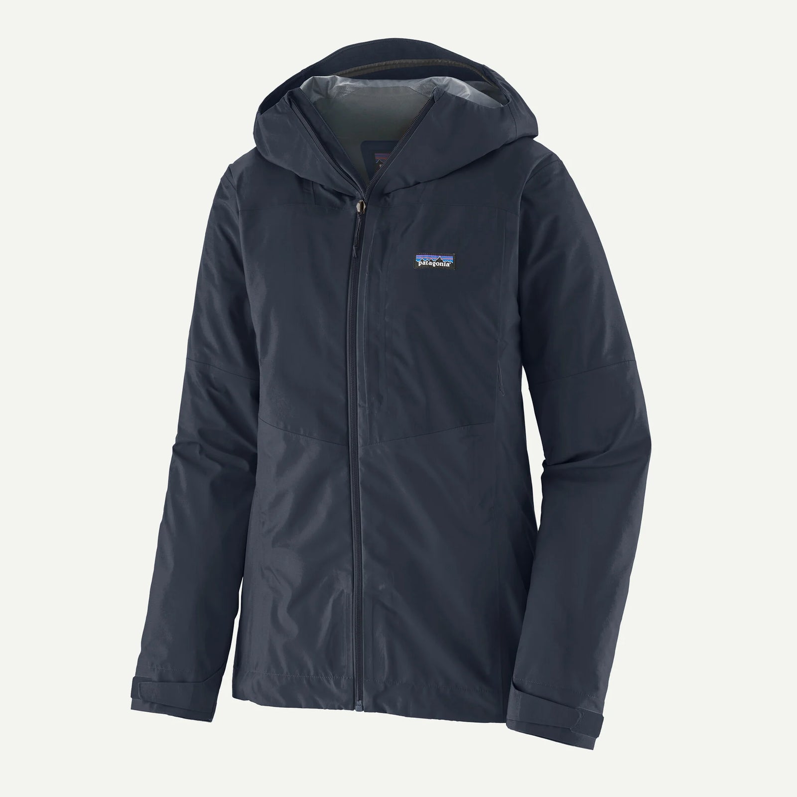 Dark blue jacket with a brand logo on a light gray background