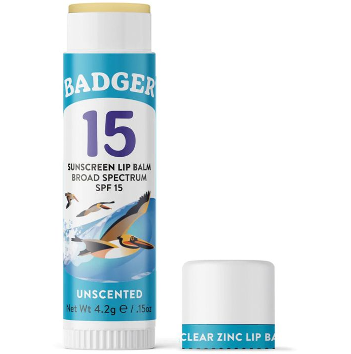 the badger balm 15 spf zinc lip balm with the cap off