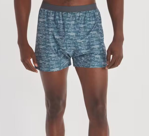Ex Officio Men's Give-N-Go 2.0 Boxer in the pattern steel blue fish, worn by model