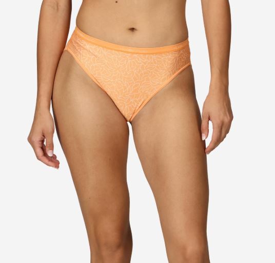 Ex Officio Women's Give-N-Go 2.0 Bikini Brief in the pattern bellini mosaic (peach with geometric patterns), worn by model, front view