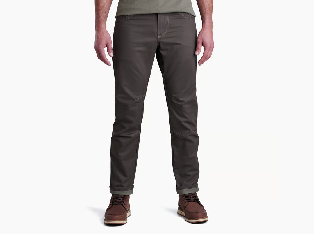 MAN WEARING DARK GREY PANTS